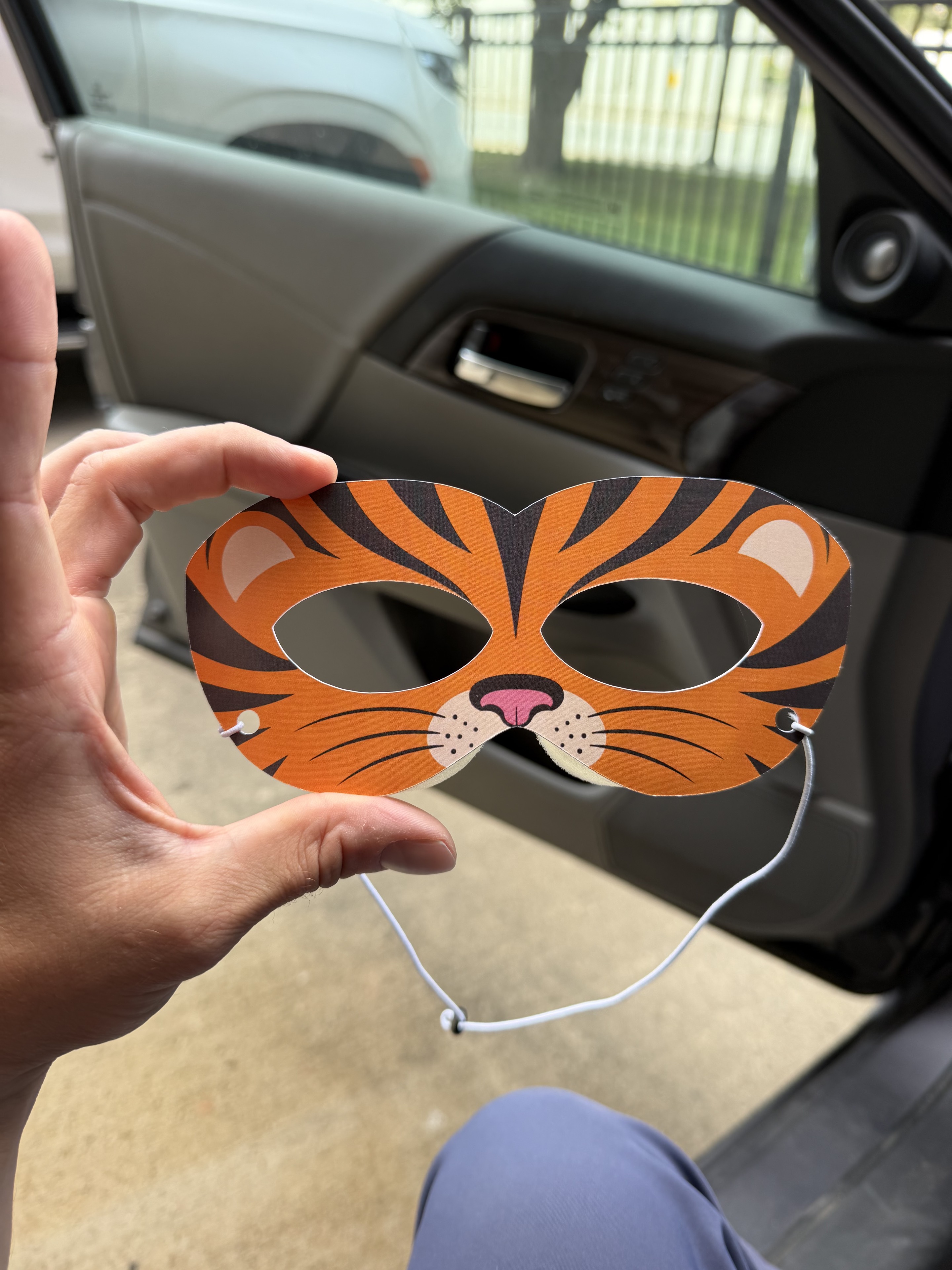 Front view of the orange tiger pediatric character mask